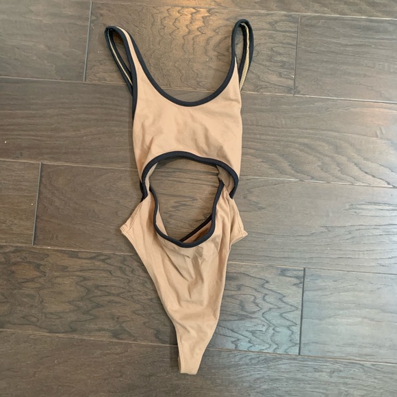 Urban Outfitters Tops - Cut out body suit